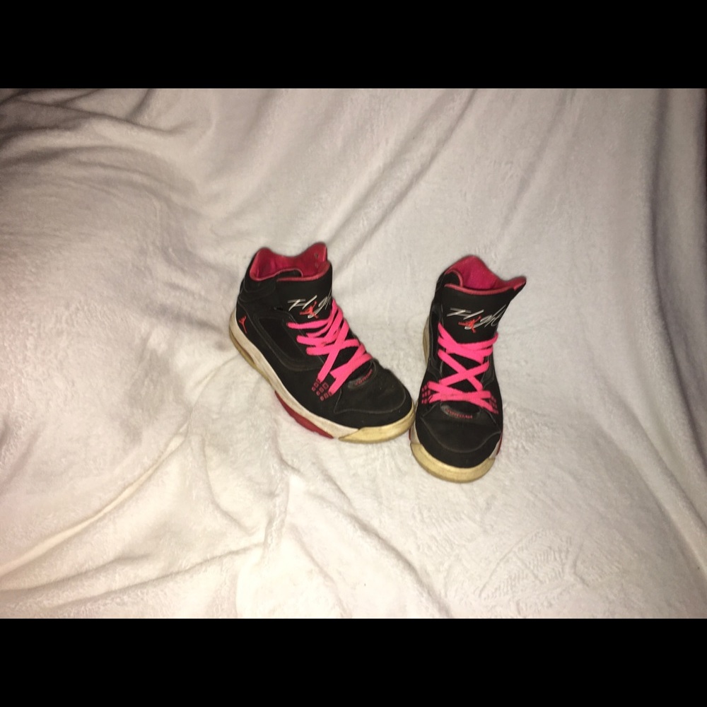Pink and black Jordan’s